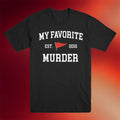 My Favorite Murder Merch 2026 MFM Collegiate T-Shirt Black Gift Ideas For Husband - Merchluma