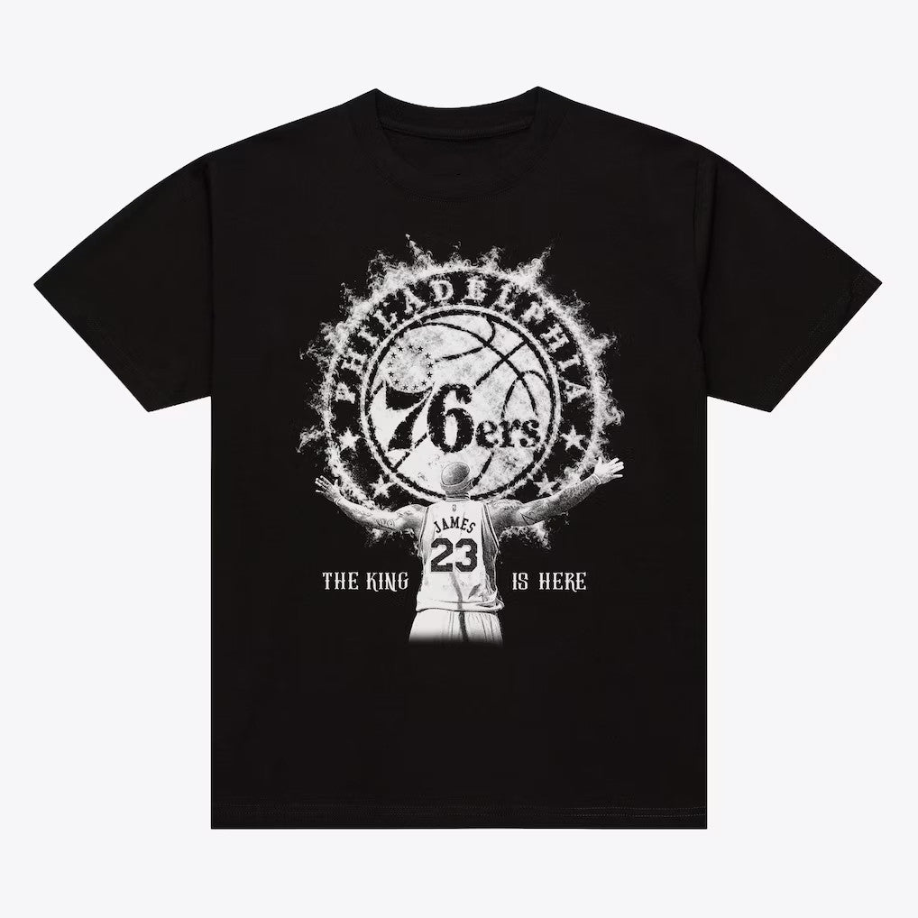 Lebron James Merch 2026 LeBron James #23 Philadelphia 76ers T-Shirt The King Is Here Shirt Black - Merchluma
