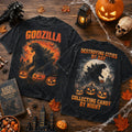 Godzilla Halloween 2026 Horror Themed T-Shirt Destroying Cities By Day Collecting Candy Bi Night - Merchluma