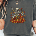 Skeleton Jumping In Fall Leaves Shirt Funny Halloween Shirt Spooky Autumn Gifts For Her - Merchluma
