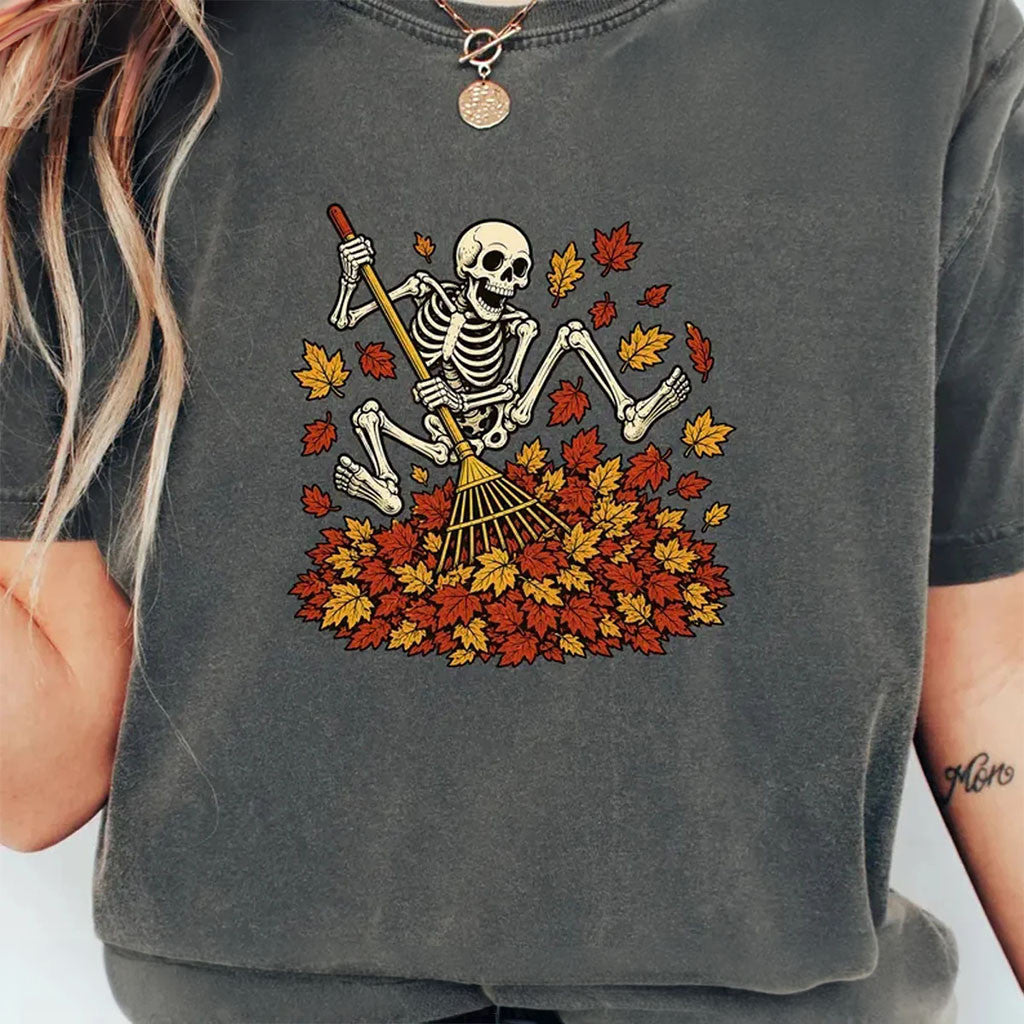 Skeleton Jumping In Fall Leaves Shirt Funny Halloween Shirt Spooky Autumn Gifts For Her - Merchluma