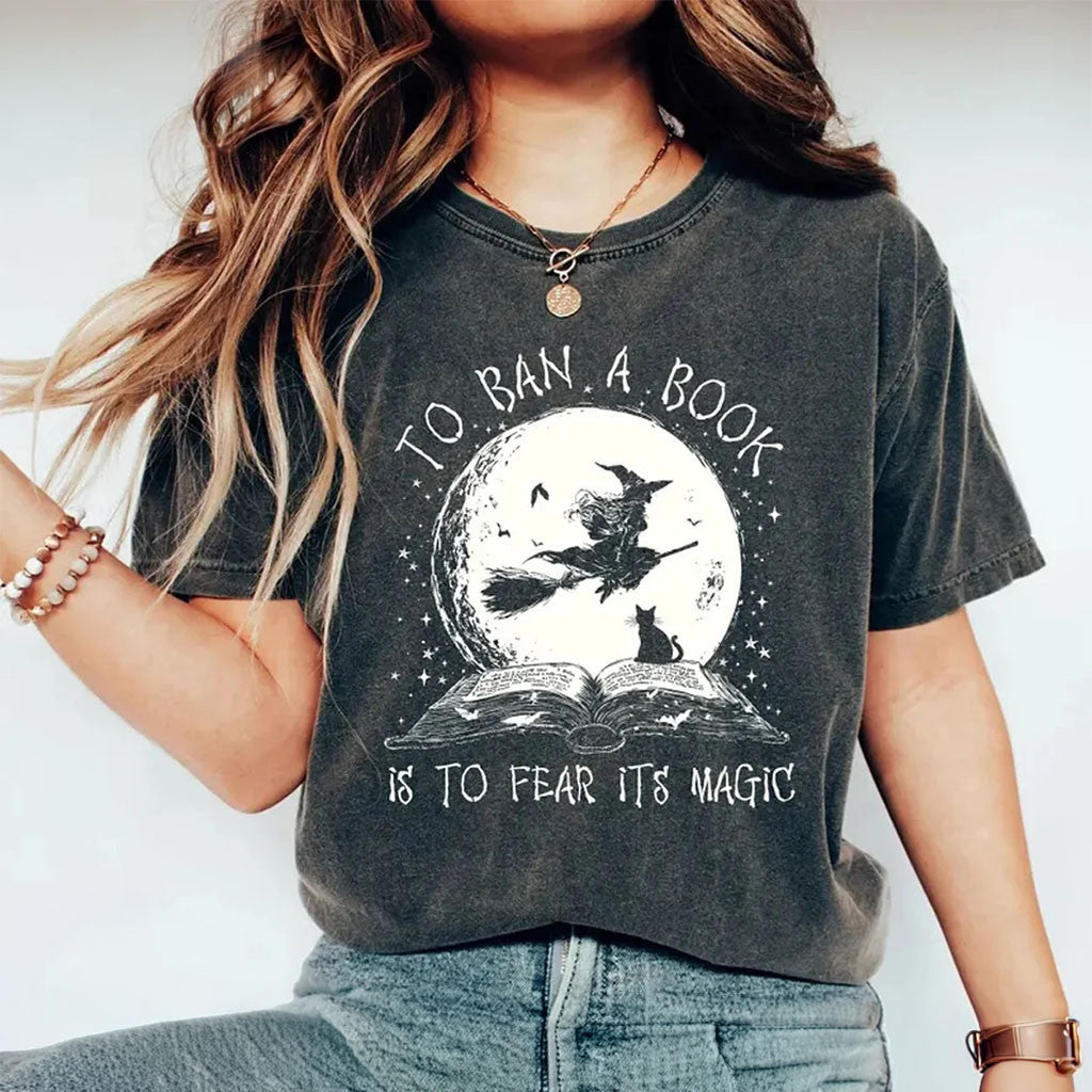 Halloween Witch To Ban A Book Is To Fear It's Magic Washed Shirt Reading Witch Library Gifts For Her - Merchluma