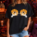 Breast Cancer Awareness Halloween Skeleton Hands And Orange Pumpkins T-Shirt Funny Gifts - Merchluma
