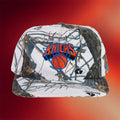 New York Sunshine Merch 2026 New York Knicks Chip Hunting Camo Snapback Hat Embroidered - Merchluma