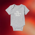 The New York Times Merch The Daily 2026 Stacked Logo Baby Onesie Unique Newborn Gifts - Merchluma